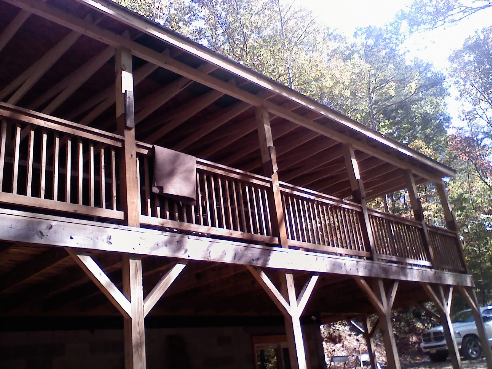 Timber framing under a new elevated porch and deck — Roof Leak Repair in North Canton by Roofing Brothers
